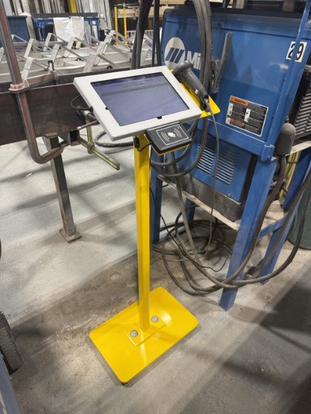 Shared tablet kiosk station on a manufacturing shop floor